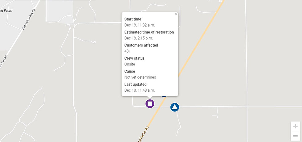 A pop-up window showing outage details on top of a GPS map.