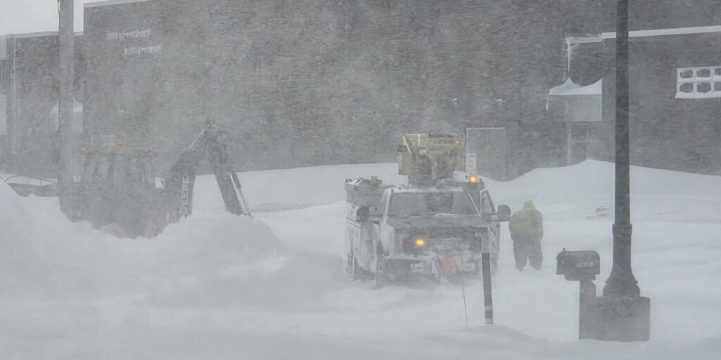A WPS lineworker responds to a power outage during a blizzard and with heavy snow on the ground.