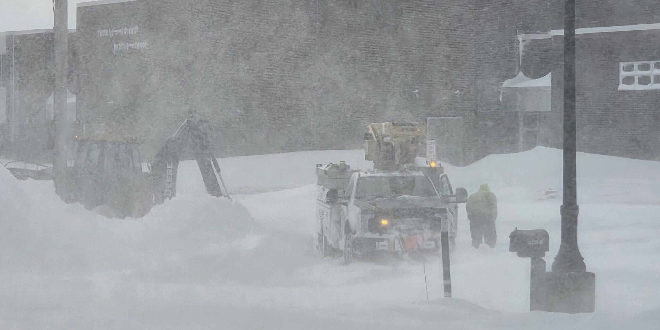 A WPS lineworker responds to a power outage during a blizzard and with heavy snow on the ground.